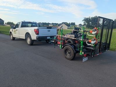Professional commercial-grade lawn mowing equipment used by Lawn Legend